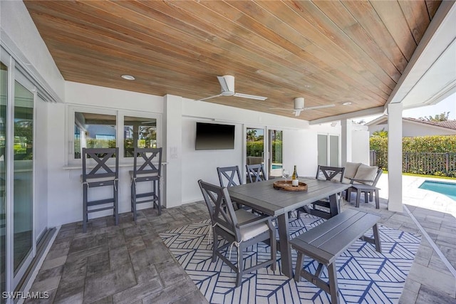 4611 Crayton Rd, Naples, FL 34103 - view of patio featuring outdoor dining area and a ceiling fan