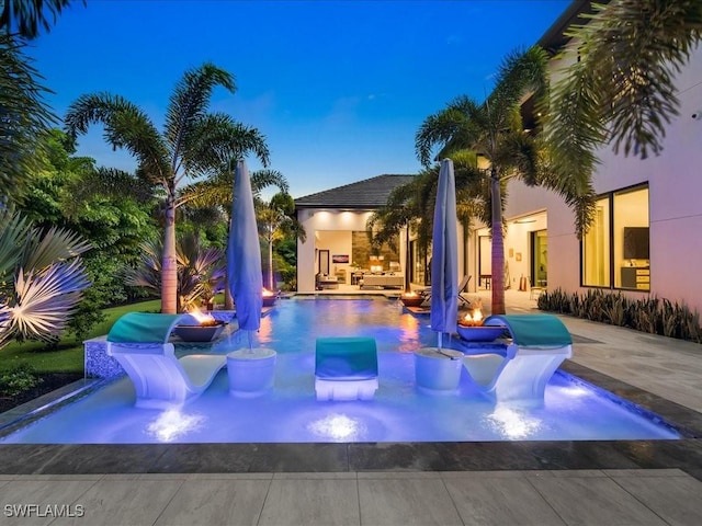 882 Cassena Rd, Naples, FL 34108 - pool with a patio, a jacuzzi, and an outdoor fire pit