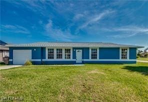 single story home featuring a garage and a front lawn