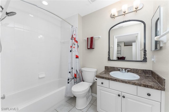 full bathroom with vanity, shower / bath combo with shower curtain, toilet, and tile patterned floors