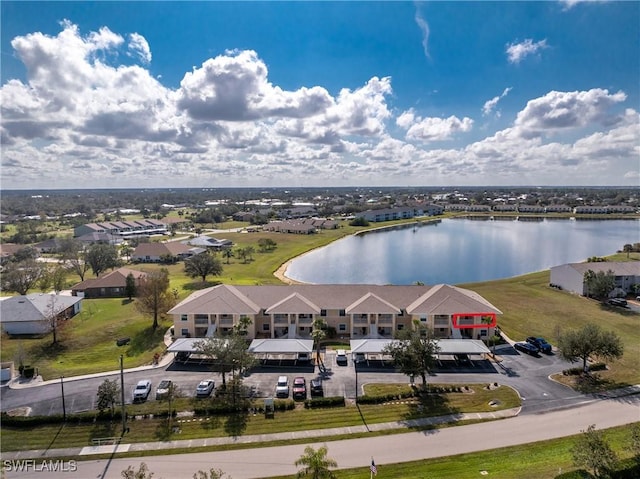 bird's eye view with a water view and a residential view