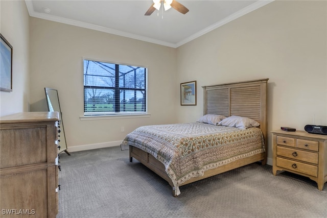 carpeted bedroom with crown molding and ceiling fan