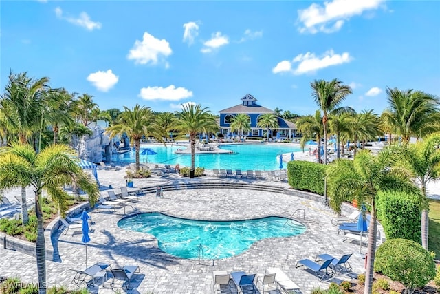 community pool featuring a patio area