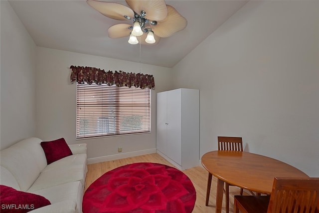 interior space featuring vaulted ceiling, light hardwood / wood-style floors, and ceiling fan