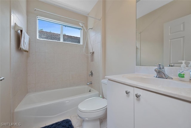 full bathroom with vanity, tile patterned flooring, toilet, and tiled shower / bath