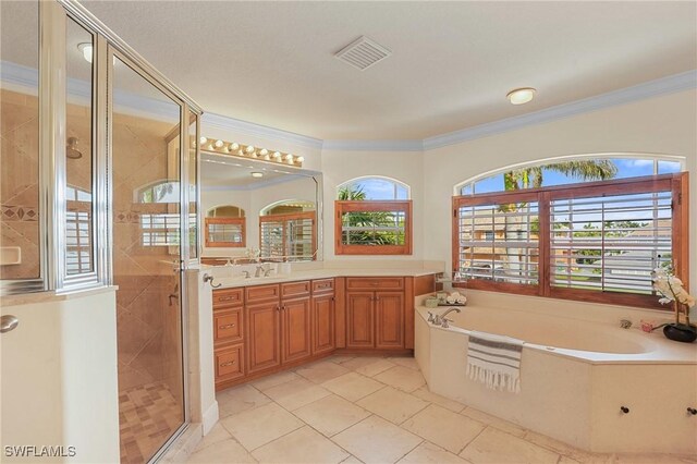 full bath featuring a shower stall, visible vents, crown molding, and vanity