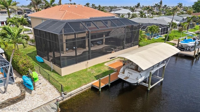 aerial view featuring a water view and a residential view