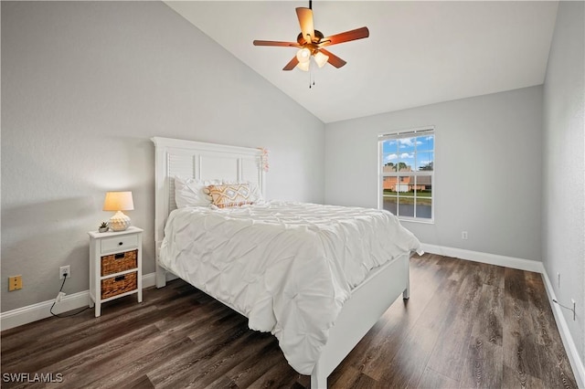 bedroom featuring ceiling fan, dark hardwood / wood-style flooring, and vaulted ceiling