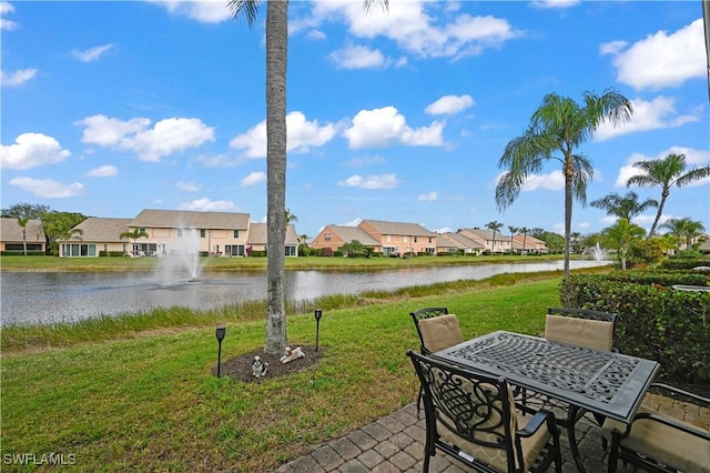 view of patio / terrace with a water view