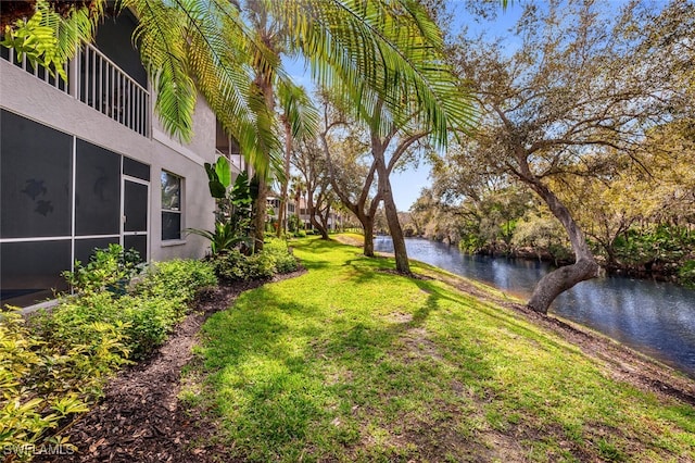 view of yard featuring a water view