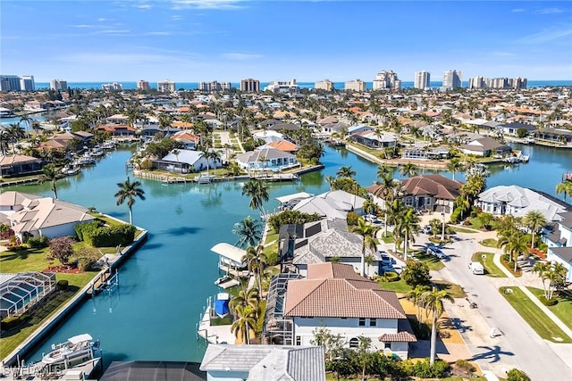 birds eye view of property featuring a water view