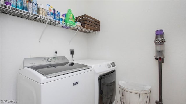 washroom featuring independent washer and dryer