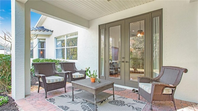 view of patio featuring french doors