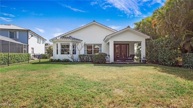 view of front of home with a front lawn