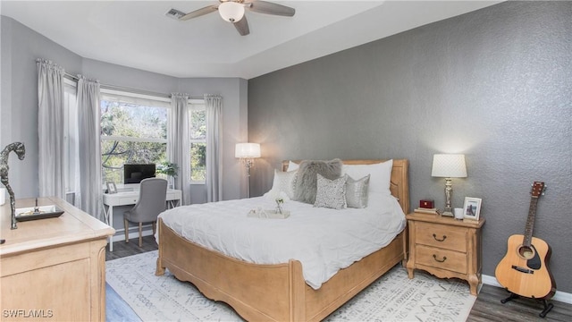 bedroom featuring ceiling fan and light hardwood / wood-style floors