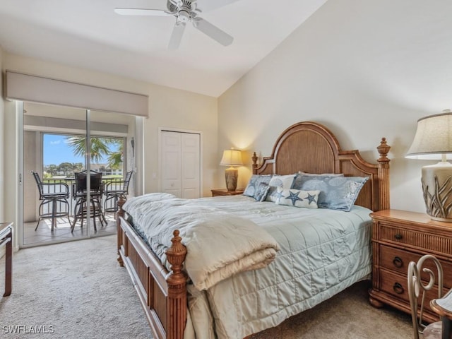 bedroom featuring carpet floors, access to outside, a closet, and lofted ceiling