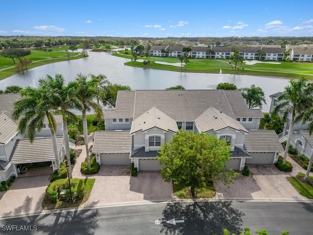 bird's eye view featuring a residential view and a water view