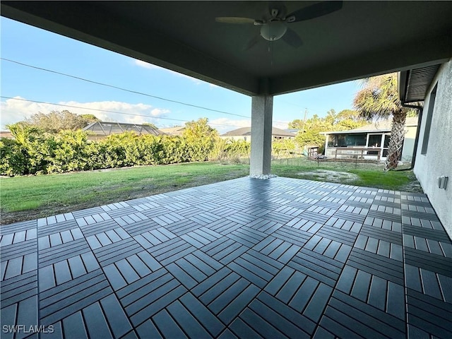 view of patio with ceiling fan