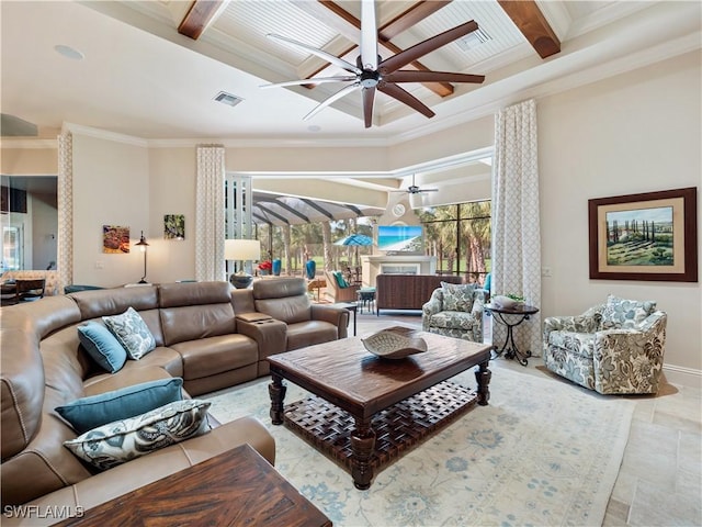 living room with crown molding, coffered ceiling, ceiling fan, and beam ceiling