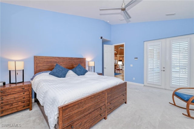 bedroom featuring lofted ceiling, access to outside, light colored carpet, and ceiling fan