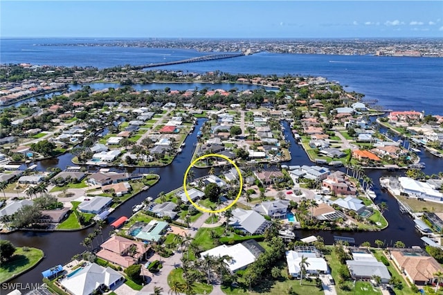 drone / aerial view featuring a water view