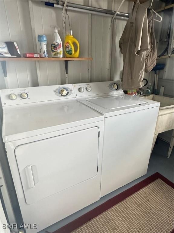 laundry room featuring laundry area and washing machine and clothes dryer