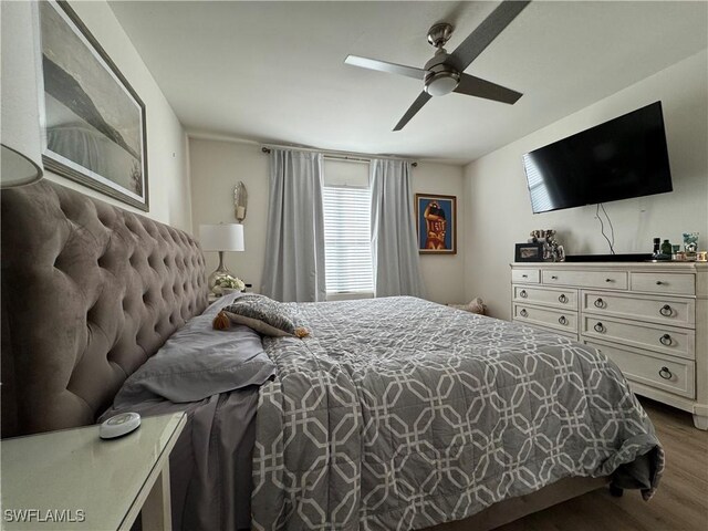 bedroom featuring ceiling fan and wood finished floors