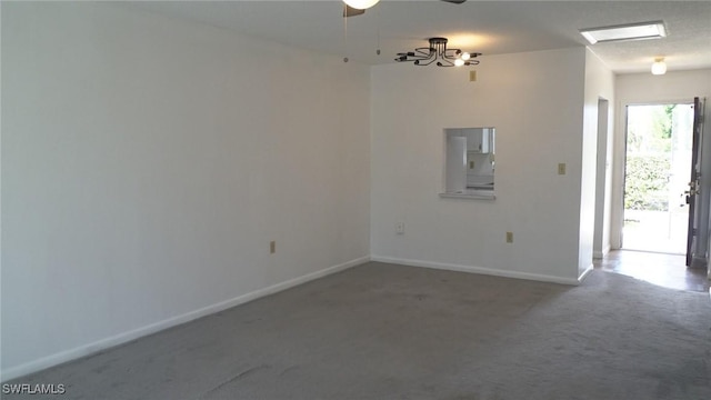 spare room with ceiling fan