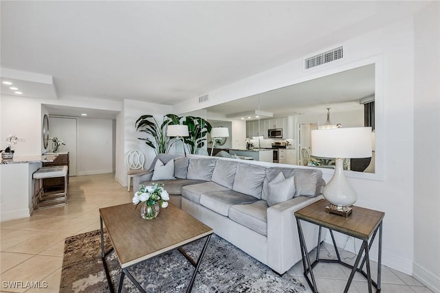 living room with light tile patterned flooring