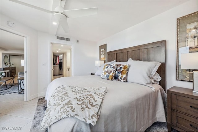 bedroom with light tile patterned floors and ceiling fan