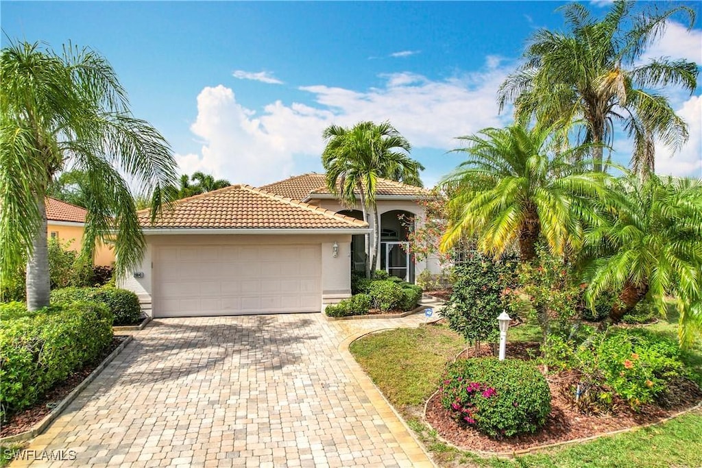 mediterranean / spanish-style house featuring a garage