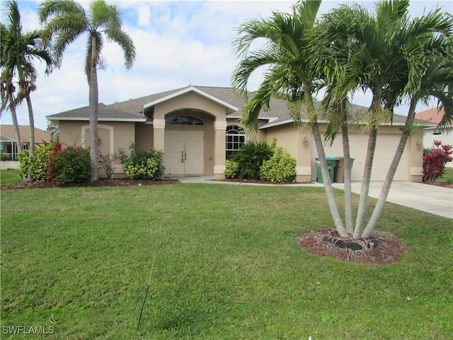 single story home featuring a garage and a front yard