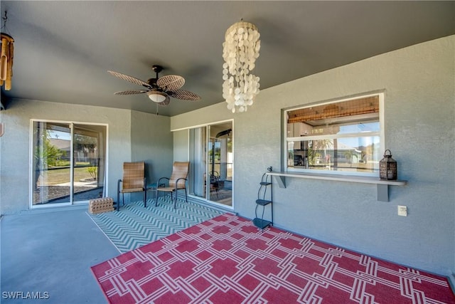 view of patio with ceiling fan