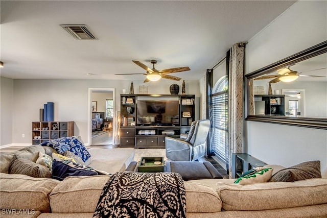 living room featuring ceiling fan