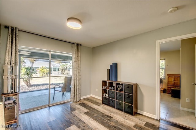 empty room with hardwood / wood-style floors