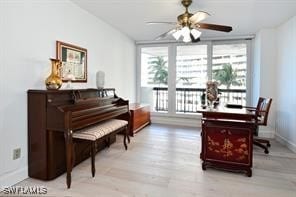 miscellaneous room with ceiling fan and light hardwood / wood-style floors