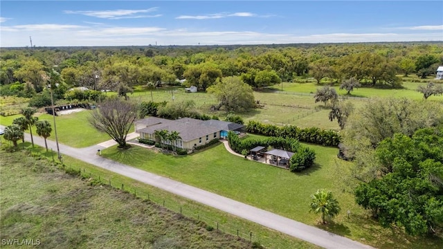 bird's eye view with a rural view and a forest view