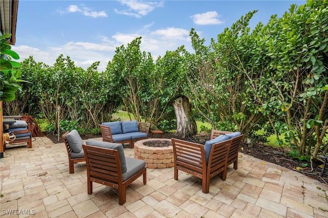 view of patio featuring an outdoor fire pit