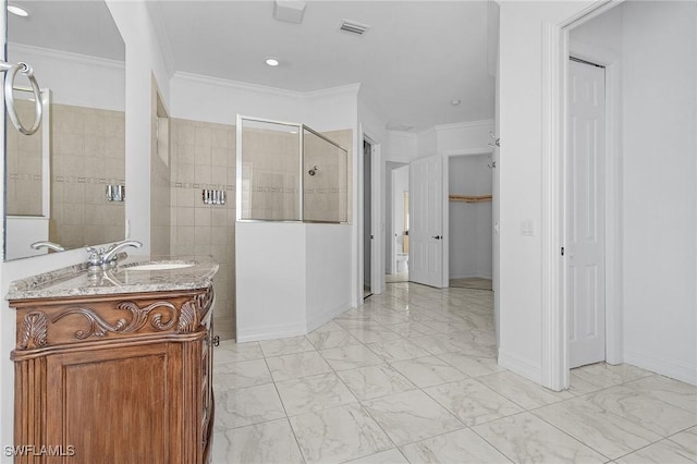 full bathroom with marble finish floor, visible vents, walk in shower, and crown molding