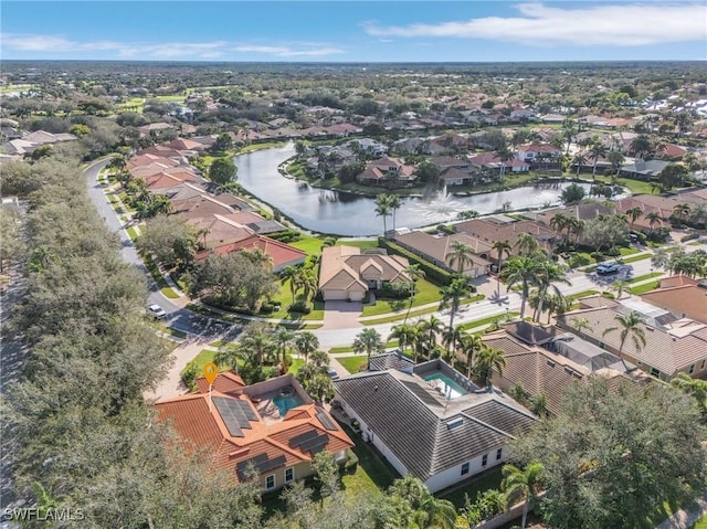 aerial view featuring a water view and a residential view