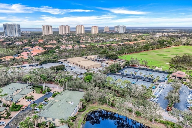 drone / aerial view with a view of city and a water view