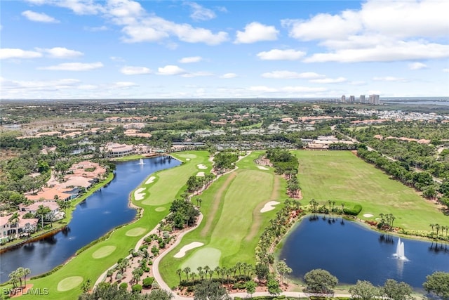 bird's eye view with golf course view and a water view