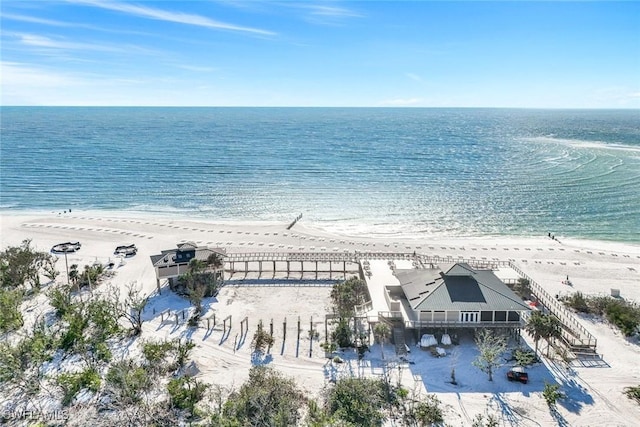 drone / aerial view with a view of the beach and a water view