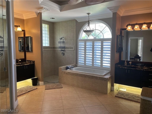 full bath featuring tiled shower, ornamental molding, two vanities, tile patterned flooring, and a bath