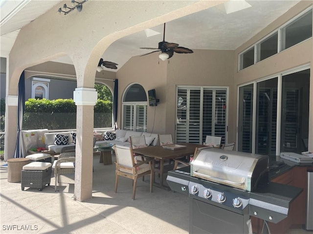 view of patio featuring outdoor dining space, outdoor lounge area, ceiling fan, and grilling area