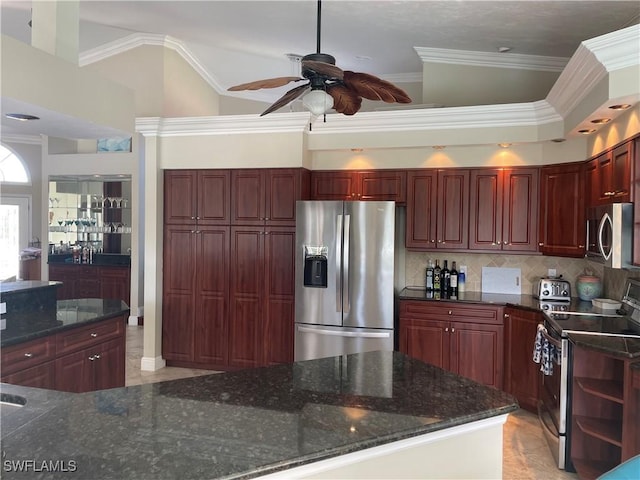 kitchen with tasteful backsplash, dark stone countertops, stainless steel appliances, crown molding, and dark brown cabinets