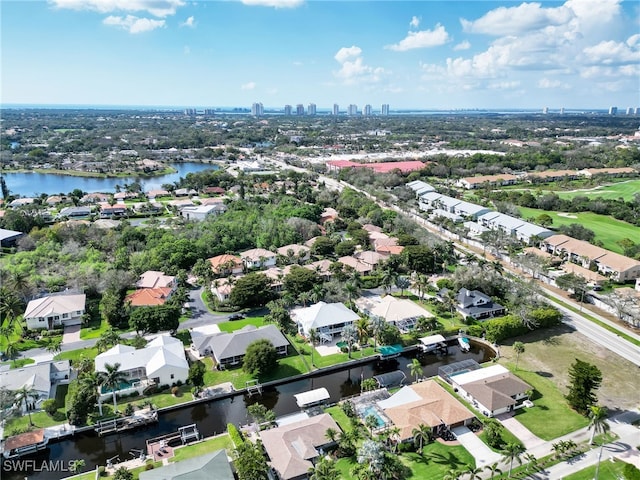 aerial view featuring a water view and a residential view