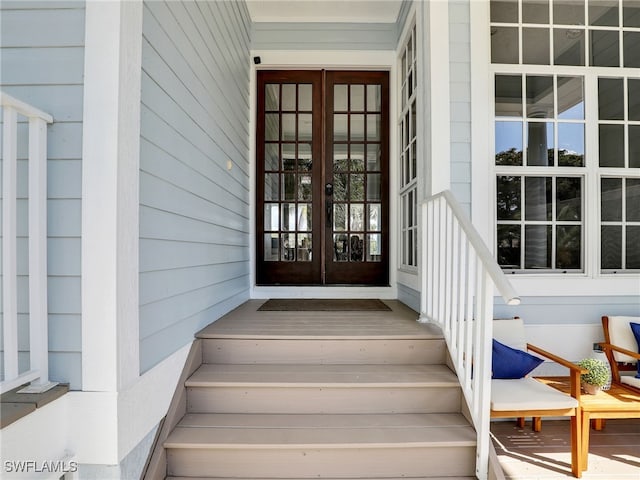 property entrance featuring french doors