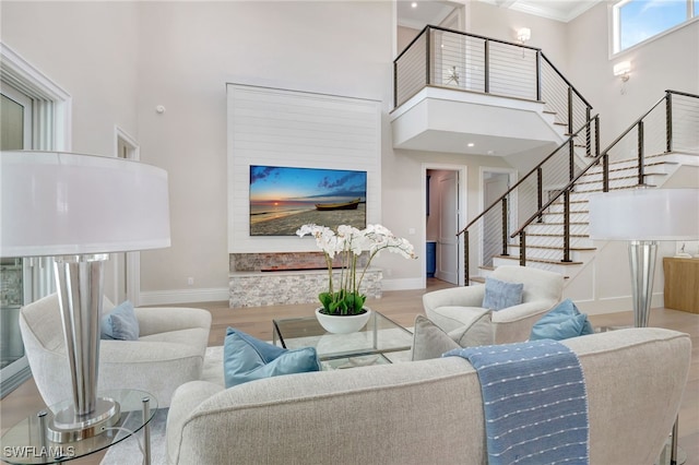1308 Ridge St, Naples, FL 34103 - living area featuring stairs, a high ceiling, and wood finished floors