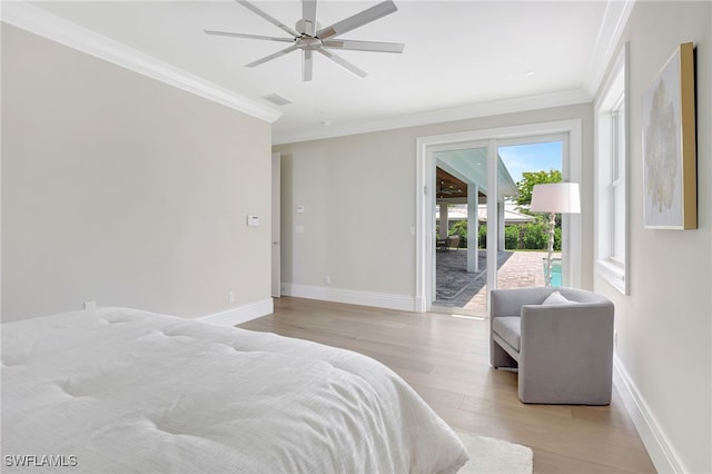 1308 Ridge St, Naples, FL 34103 - bedroom featuring access to outside, light wood-style flooring, ornamental molding, and a ceiling fan